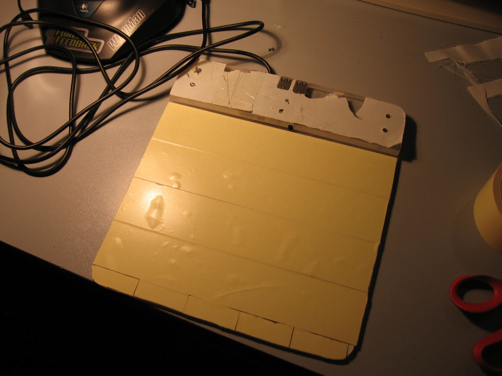 Posizionamento nastro biadesivo per incollaggio della stampa